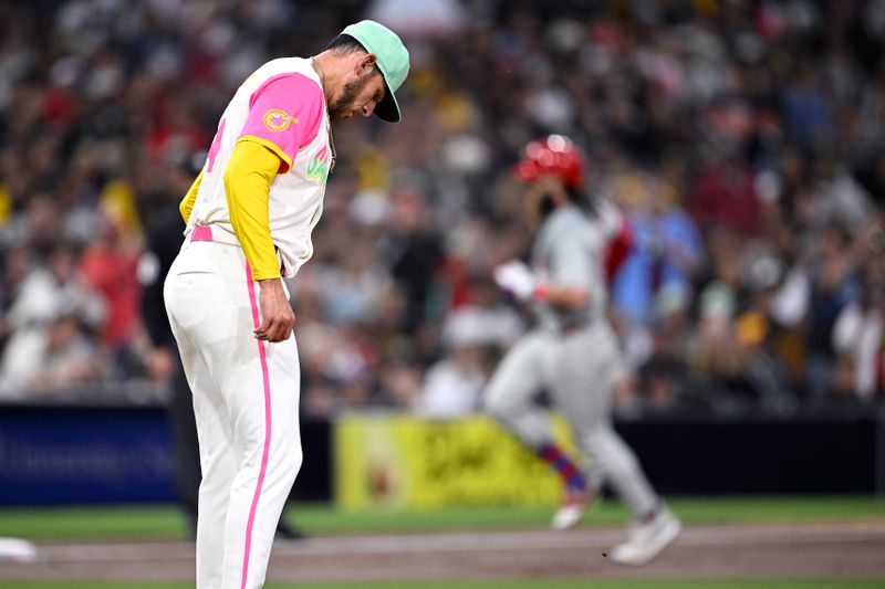 Apr 26, 2024; San Diego, California, USA; San Diego Padres starting pitcher Joe Musgrove (44) reacts as Philadelphia Phillies left fielder Brandon Marsh (16) rounds the bases after hitting a two-run home run during the third inning at Petco Park. Mandatory Credit: Orlando Ramirez-USA TODAY Sports