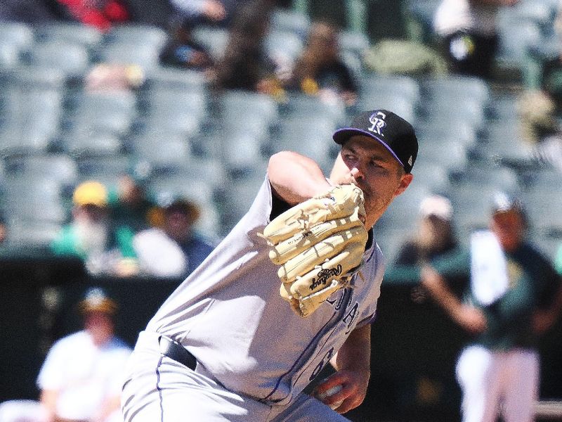 May 23, 2024; Oakland, California, USA; Colorado Rockies relief pitcher Jalen Beeks (68) pitches against the Oakland Athletics during the ninth inning at Oakland-Alameda County Coliseum. Mandatory Credit: Kelley L Cox-USA TODAY Sports