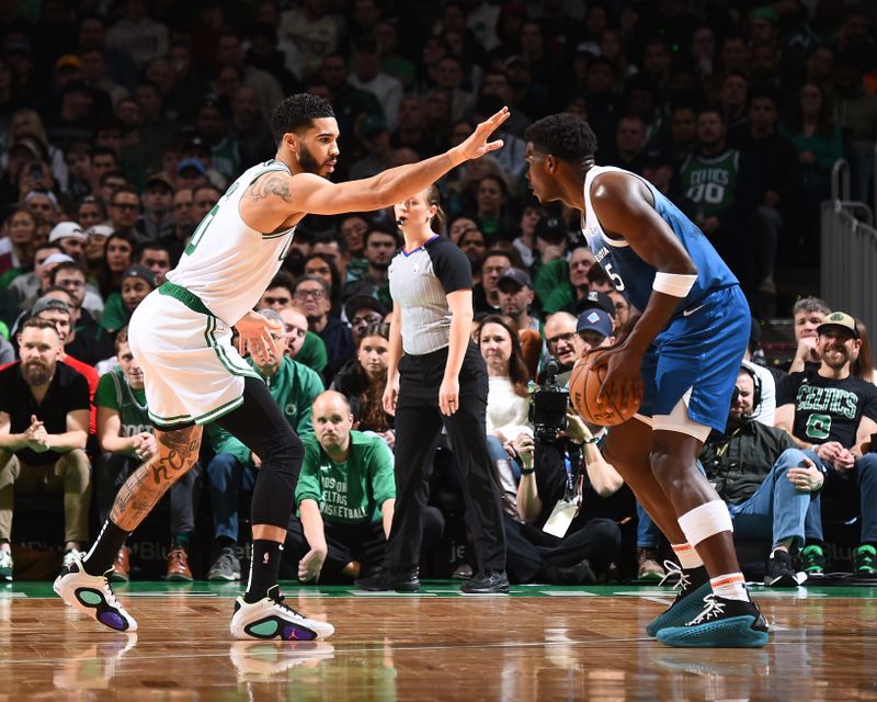 BOSTON, MA - JANUARY 10: Jayson Tatum #0 of the Boston Celtics plays defense during the game  against Anthony Edwards #5 of the Minnesota Timberwolves on January 10, 2024 at the TD Garden in Boston, Massachusetts. NOTE TO USER: User expressly acknowledges and agrees that, by downloading and or using this photograph, User is consenting to the terms and conditions of the Getty Images License Agreement. Mandatory Copyright Notice: Copyright 2024 NBAE  (Photo by Brian Babineau/NBAE via Getty Images)