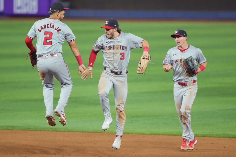 Sep 3, 2024; Miami, Florida, USA;  Washington Nationals right fielder Dylan Crews (3) celebrates a victory over the Miami Marlins with second baseman Luis García Jr. (2) and center fielder Jacob Young, right, at loanDepot Park. Mandatory Credit: Jim Rassol-Imagn Images.