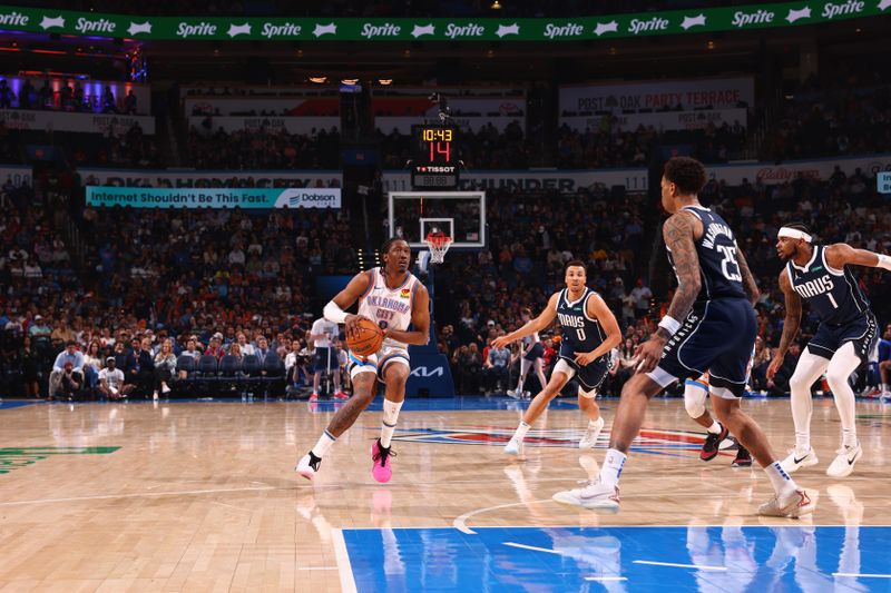 OKLAHOMA CITY, OK - MARCH 14: Jalen Williams #8 of the Oklahoma City Thunder handles the ball during the game against the Dallas Mavericks on March 13, 2024 at Paycom Arena in Oklahoma City, Oklahoma. NOTE TO USER: User expressly acknowledges and agrees that, by downloading and or using this photograph, User is consenting to the terms and conditions of the Getty Images License Agreement. Mandatory Copyright Notice: Copyright 2024 NBAE (Photo by Zach Beeker/NBAE via Getty Images)