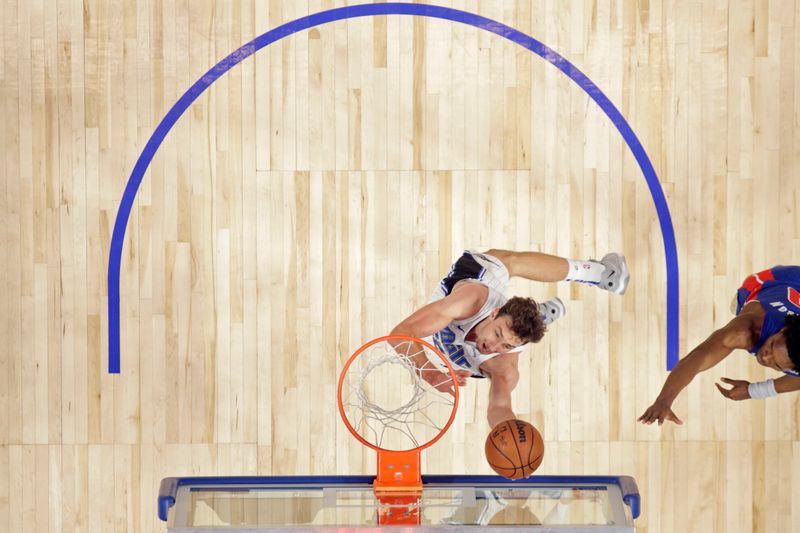 DETROIT, MI - FEBRUARY 4: Franz Wagner #22 of the Orlando Magic drives to the basket during the game against the Detroit Pistons on February 4, 2024 at Little Caesars Arena in Detroit, Michigan. NOTE TO USER: User expressly acknowledges and agrees that, by downloading and/or using this photograph, User is consenting to the terms and conditions of the Getty Images License Agreement. Mandatory Copyright Notice: Copyright 2024 NBAE (Photo by Brian Sevald/NBAE via Getty Images)