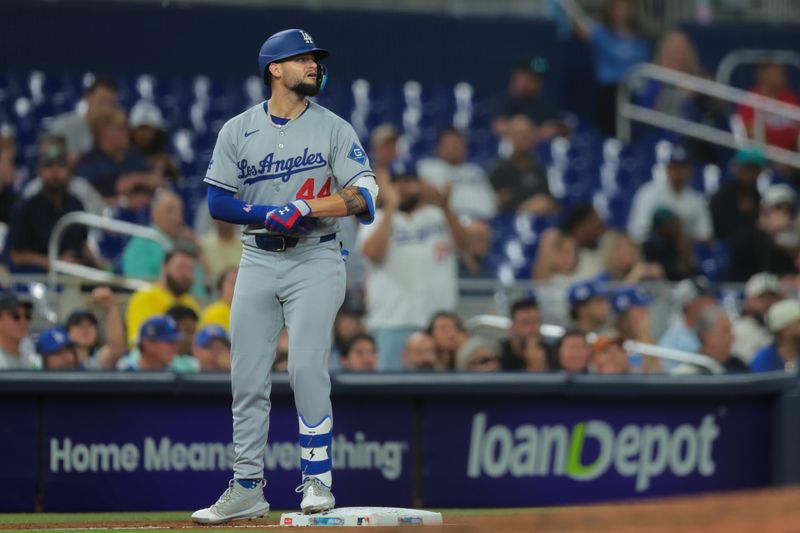 May 5, 2025; Miami, Florida, USA; Los Angeles Dodgers center fielder Andy Pages (44) looks on from third base after hitting a triple against the Miami Marlins during the eighth inning at loanDepot Park. Mandatory Credit: Sam Navarro-Imagn Images