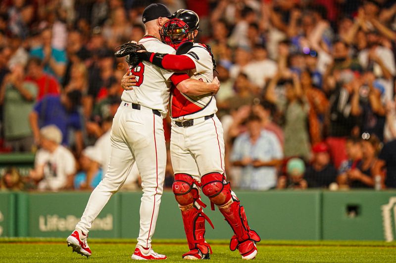 Jul 11, 2024; Boston, Massachusetts, USA; Boston Red Sox relief pitcher Chase Anderson (48) and catcher Connor Wong (12) reacts after defeating the Oakland Athletics in nine innings at Fenway Park. Mandatory Credit: David Butler II-USA TODAY Sports