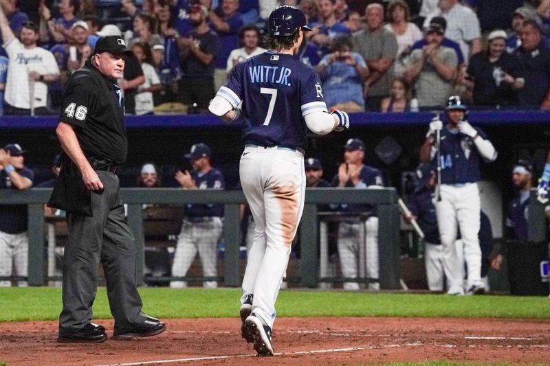 Sep 29, 2023; Kansas City, Missouri, USA; Kansas City Royals shortstop Bobby Witt Jr. (7) runs to home plate after hitting his 30th home run of his career, a two run home run against the New York Yankees in the seventh inning at Kauffman Stadium. Mandatory Credit: Denny Medley-USA TODAY Sports