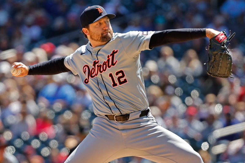 Apr 21, 2024; Minneapolis, Minnesota, USA; Detroit Tigers starting pitcher Casey Mize (12) throws to the Minnesota Twins in the first inning at Target Field. Mandatory Credit: Bruce Kluckhohn-USA TODAY Sports