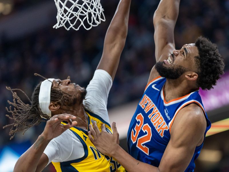 INDIANAPOLIS, INDIANA - NOVEMBER 10: Karl-Anthony Towns #32 of the New York Knicks shoots the ball against Myles Turner #33 of the Indiana Pacers at Gainbridge Fieldhouse on November 10, 2024 in Indianapolis, Indiana. NOTE TO USER: User expressly acknowledges and agrees that, by downloading and or using this photograph, User is consenting to the terms and conditions of the Getty Images License Agreement. (Photo by Michael Hickey/Getty Images)