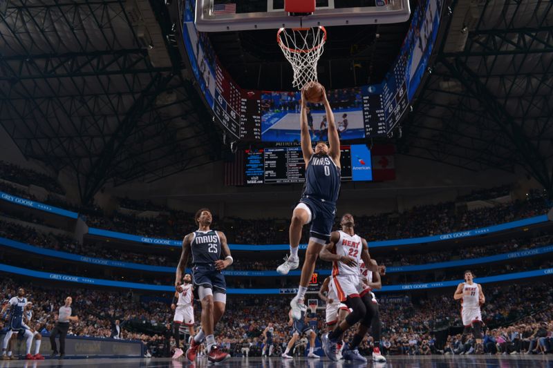 DALLAS, TX - MARCH 7: Dante Exum #0 of the Dallas Mavericks dunks the ball during the game against the Miami Heat on March 7, 2024 at the American Airlines Center in Dallas, Texas. NOTE TO USER: User expressly acknowledges and agrees that, by downloading and or using this photograph, User is consenting to the terms and conditions of the Getty Images License Agreement. Mandatory Copyright Notice: Copyright 2024 NBAE (Photo by Glenn James/NBAE via Getty Images)