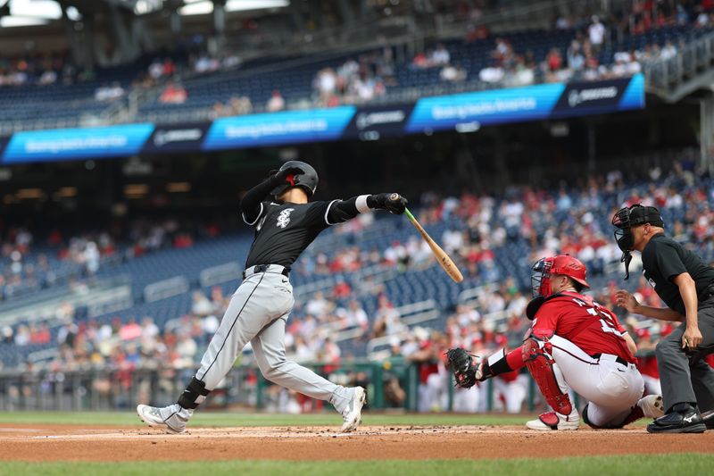 Sep 28, 2025; Washington, District of Columbia, USA; Chicago White Sox third baseman Miguel Vargas (20) hits a two run home run against the Washington Nationals during the first inning at Nationals Park. Mandatory Credit: Geoff Burke-Imagn Images