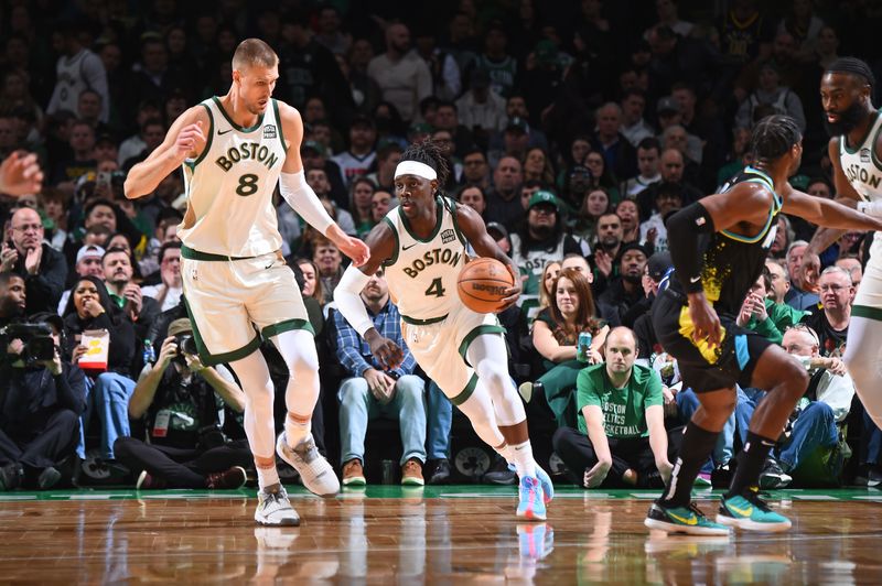 BOSTON, MA - JANUARY 30: Jrue Holiday #4 of the Boston Celtics dribbles the ball during the game against the Indiana Pacers on January 30, 2024 at the TD Garden in Boston, Massachusetts. NOTE TO USER: User expressly acknowledges and agrees that, by downloading and or using this photograph, User is consenting to the terms and conditions of the Getty Images License Agreement. Mandatory Copyright Notice: Copyright 2024 NBAE  (Photo by Brian Babineau/NBAE via Getty Images)