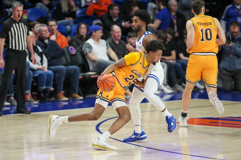 Feb 11, 2023; Boise, Idaho, USA; Wyoming Cowboys forward Jeremiah Oden (25) drives past Boise State Broncos guard Kobe Young (3) during the second half  at ExtraMile Arena. Boise State beats Wyoming 75-63. Mandatory Credit: Brian Losness-USA TODAY Sports
ports