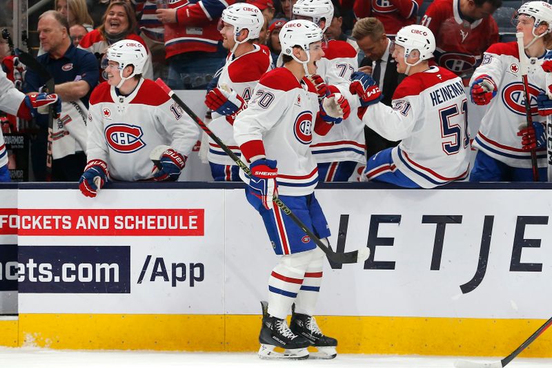 Nov 27, 2024; Columbus, Ohio, USA; Montreal Canadiens left wing Juraj Slafkovsky (20) celebrates his goal against the Columbus Blue Jackets during the first period at Nationwide Arena. Mandatory Credit: Russell LaBounty-Imagn Images