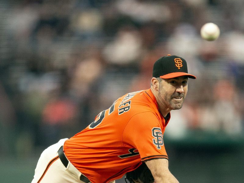 Apr 25, 2025; San Francisco, California, USA; San Francisco Giants starting pitcher Justin Verlander (35) delivers a pitch against the Texas Rangers during the first inning at Oracle Park. Mandatory Credit: D. Ross Cameron-Imagn Images
