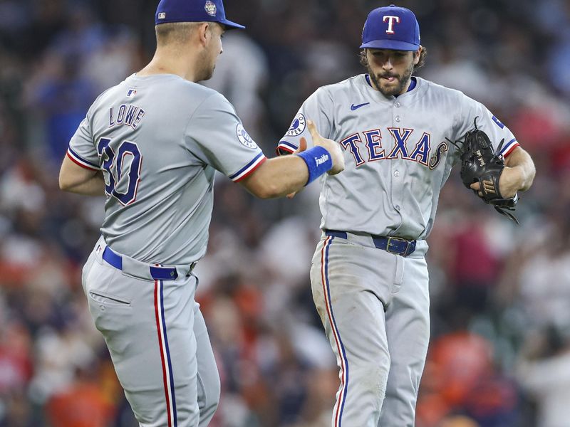 Jul 14, 2024; Houston, Texas, USA; Texas Rangers third baseman Josh Smith (8) celebrates with first baseman Nathaniel Lowe (30) after the game against the Houston Astros at Minute Maid Park. Mandatory Credit: Troy Taormina-USA TODAY Sports