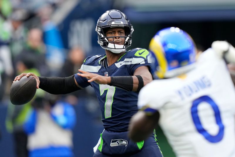 Seattle Seahawks quarterback Geno Smith (7) passes against the Los Angeles Rams during the first half of an NFL football game in Seattle, Sunday, Nov. 3, 2024. (AP Photo/Stephen Brashear)