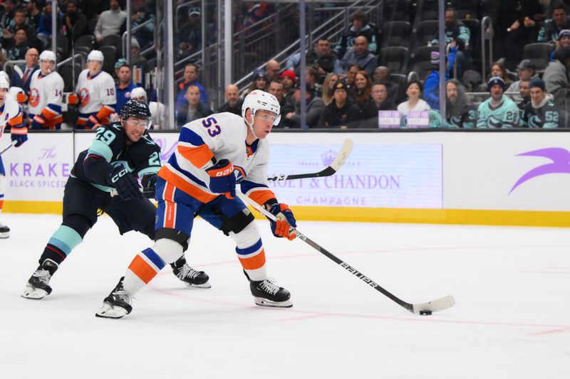 Nov 16, 2023; Seattle, Washington, USA; New York Islanders center Casey Cizikas (53)ref10 advances the puck while Seattle Kraken defenseman Vince Dunn (29) defends during the second period at Climate Pledge Arena. Mandatory Credit: Steven Bisig-USA TODAY Sports