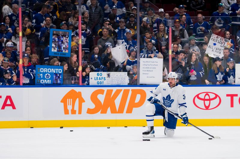 Jan 20, 2024; Vancouver, British Columbia, CAN; Toronto Maple Leafs forward Auston Matthews (34) rests during warm up prior to a game against the Vancouver Canucks at Rogers Arena.  Mandatory Credit: Bob Frid-USA TODAY Sports