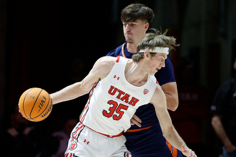 Dec 13, 2022; Salt Lake City, Utah, USA; Utah Utes center Branden Carlson (35) looks to drive against Texas-San Antonio Roadrunners forward Jacob Germany (24) in the first half at Jon M. Huntsman Center. Mandatory Credit: Jeffrey Swinger-USA TODAY Sports