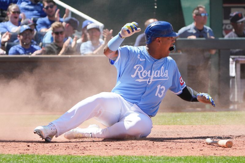 May 22, 2024; Kansas City, Missouri, USA; Kansas City Royals designated hitter Salvador Perez (13) scores against the Detroit Tigers in the seventh inning at Kauffman Stadium. Mandatory Credit: Denny Medley-USA TODAY Sports