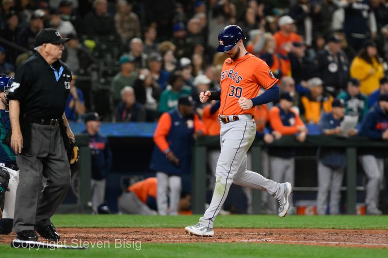 Sep 27, 2023; Seattle, Washington, USA; Houston Astros right fielder Kyle Tucker (30) scores a run against the Seattle Mariners during the seventh inning at T-Mobile Park. Mandatory Credit: Steven Bisig-USA TODAY Sports