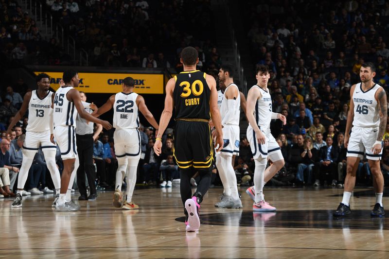 SAN FRANCISCO, CA - MARCH 20: Stephen Curry #30 of the Golden State Warriors looks on during the game against the Memphis Grizzlies on March 20, 2024 at Chase Center in San Francisco, California. NOTE TO USER: User expressly acknowledges and agrees that, by downloading and or using this photograph, user is consenting to the terms and conditions of Getty Images License Agreement. Mandatory Copyright Notice: Copyright 2024 NBAE (Photo by Noah Graham/NBAE via Getty Images)