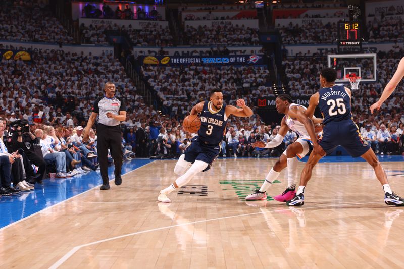 OKLAHOMA CITY, OK - APRIL 21:  CJ McCollum #3 of the New Orleans Pelicans goes to the basket during the game against the Oklahoma City Thunder during Round 1 Game 1 of the 2024 NBA Playoffs on April 21, 2024 at Paycom Arena in Oklahoma City, Oklahoma. NOTE TO USER: User expressly acknowledges and agrees that, by downloading and or using this photograph, User is consenting to the terms and conditions of the Getty Images License Agreement. Mandatory Copyright Notice: Copyright 2024 NBAE (Photo by Zach Beeker/NBAE via Getty Images)