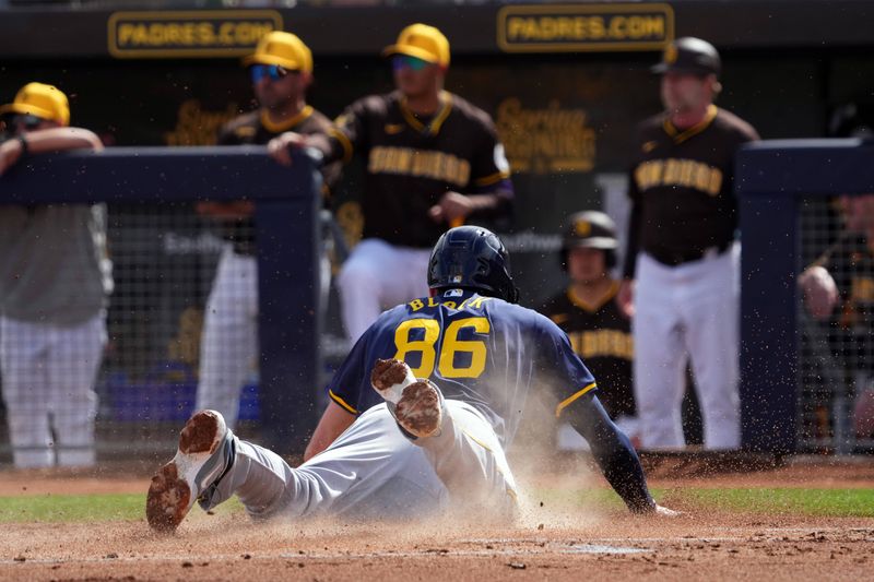 Feb 24, 2024; Peoria, Arizona, USA; Milwaukee Brewers first baseman Tyler Black (86) scores a run against the San Diego Padres during the first inning of a Spring Training game at Peoria Sports Complex. Mandatory Credit: Joe Camporeale-USA TODAY Sports