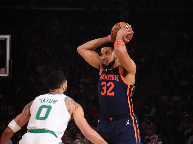 NEW YORK, NY - MAY 12: Karl-Anthony Towns #32 of the New York Knicks looks to pass the ball during the game agains the Boston Celtics during Round 2 Game 4 of the 2025 NBA Playoffs on May 12, 2025 at Madison Square Garden in New York City, New York.  NOTE TO USER: User expressly acknowledges and agrees that, by downloading and or using this photograph, User is consenting to the terms and conditions of the Getty Images License Agreement. Mandatory Copyright Notice: Copyright 2025 NBAE  (Photo by Nathaniel S. Butler/NBAE via Getty Images)