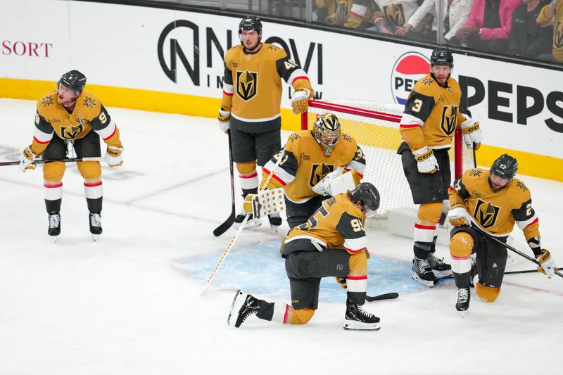 May 14, 2025; Las Vegas, Nevada, USA; Vegas Golden Knights players react after Edmonton Oilers right wing Kasperi Kapanen (not pictured) scored a game-winning goal in overtime to give the Oilers a 1-0 victory in the game and a 4-1 series win during game five of the second round of the 2025 Stanley Cup Playoffs at T-Mobile Arena. Mandatory Credit: Stephen R. Sylvanie-Imagn Images