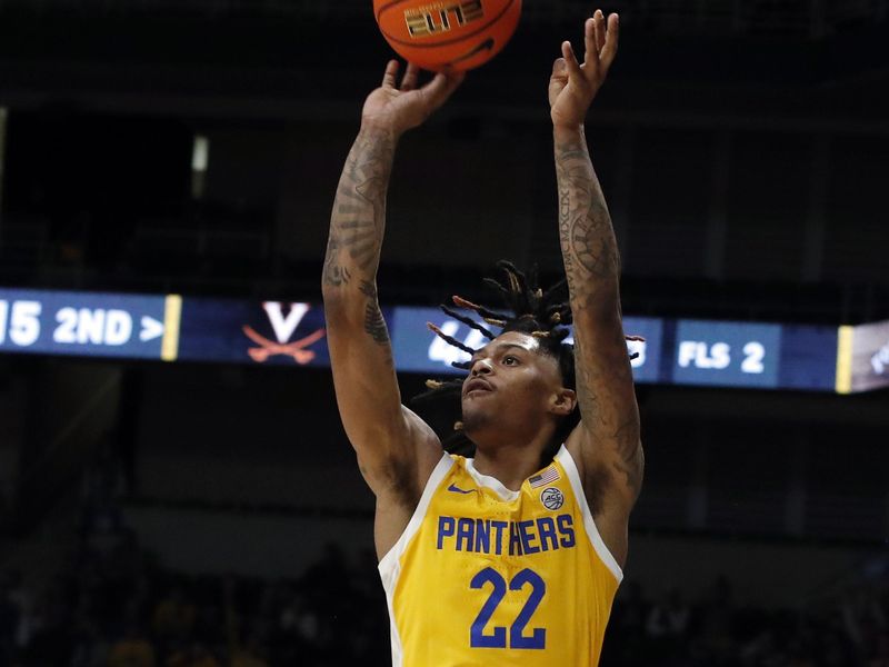 Jan 3, 2023; Pittsburgh, Pennsylvania, USA;  Pittsburgh Panthers guard Nike Sibande (22) shoots a three point basket against the Virginia Cavaliers during the second half at the Petersen Events Center. Pittsburgh won 68-65. Mandatory Credit: Charles LeClaire-USA TODAY Sports