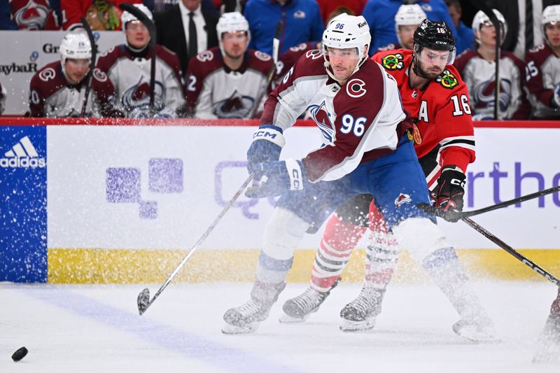 Dec 19, 2023; Chicago, Illinois, USA; Colorado Avalanche forward Mikko Rantanen (96) passes the puck in the second period against the Chicago Blackhawks at United Center. Mandatory Credit: Jamie Sabau-USA TODAY Sports