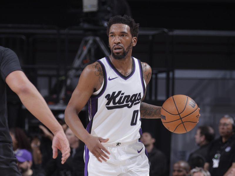 SACRAMENTO, CA - MARCH 19:   Malik Monk #0 of the Sacramento Kings dribbles the ball during the game against the Cleveland Cavaliers on March 19, 2025 at Golden 1 Center in Sacramento, California. NOTE TO USER: User expressly acknowledges and agrees that, by downloading and or using this Photograph, user is consenting to the terms and conditions of the Getty Images License Agreement. Mandatory Copyright Notice: Copyright 2025 NBAE (Photo by Rocky Widner/NBAE via Getty Images)