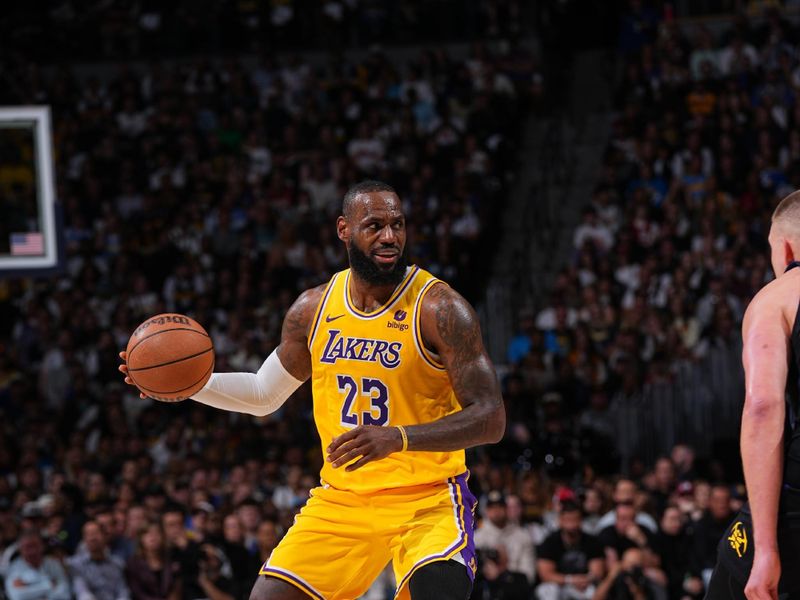 DENVER, CO - APRIL 22: LeBron James #23 of the Los Angeles Lakers handles the ball during the game against the Denver Nuggets on April 22, 2024 at the Ball Arena in Denver, Colorado. NOTE TO USER: User expressly acknowledges and agrees that, by downloading and/or using this Photograph, user is consenting to the terms and conditions of the Getty Images License Agreement. Mandatory Copyright Notice: Copyright 2024 NBAE (Photo by Bart Young/NBAE via Getty Images)