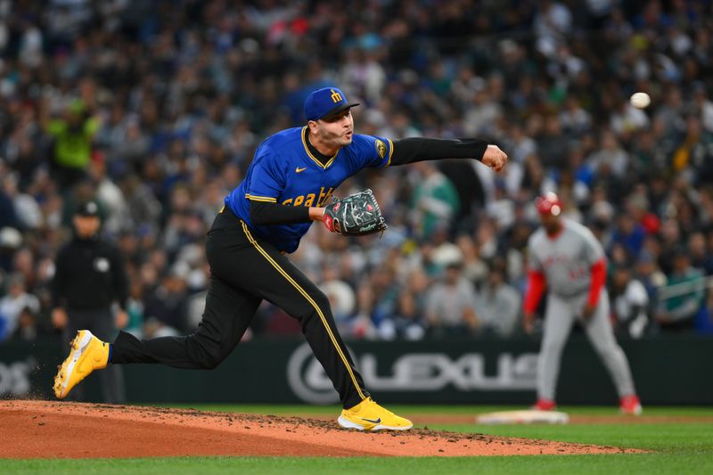 May 31, 2024; Seattle, Washington, USA; Seattle Mariners relief pitcher Tayler Saucedo (60) pitches to the Los Angeles Angels during the seventh inning at T-Mobile Park. Mandatory Credit: Steven Bisig-USA TODAY Sports