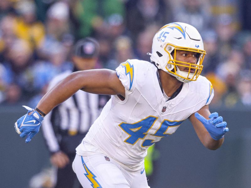 Los Angeles Chargers linebacker Tuli Tuipulotu (45) on defense during an NFL football game against the Green Bay Packers Sunday, Nov. 19, 2023, in Green Bay, Wis. (AP Photo/Jeffrey Phelps