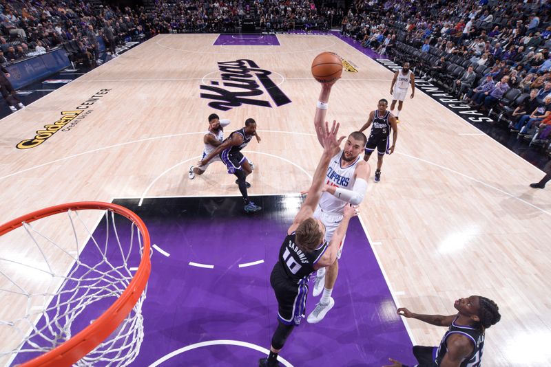 SACRAMENTO, CA - APRIL 2:  Ivica Zubac #40 of the LA Clippers goes to the basket during the game on April 2, 2024 at Golden 1 Center in Sacramento, California. NOTE TO USER: User expressly acknowledges and agrees that, by downloading and or using this Photograph, user is consenting to the terms and conditions of the Getty Images License Agreement. Mandatory Copyright Notice: Copyright 2024 NBAE (Photo by Rocky Widner/NBAE via Getty Images)