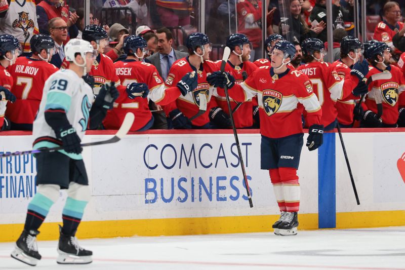 Mar 24, 2026; Sunrise, Florida, USA; Florida Panthers left wing Nolan Foote (25) celebrates after scoring against the Seattle Kraken during the second period at Amerant Bank Arena. Mandatory Credit: Sam Navarro-Imagn Images