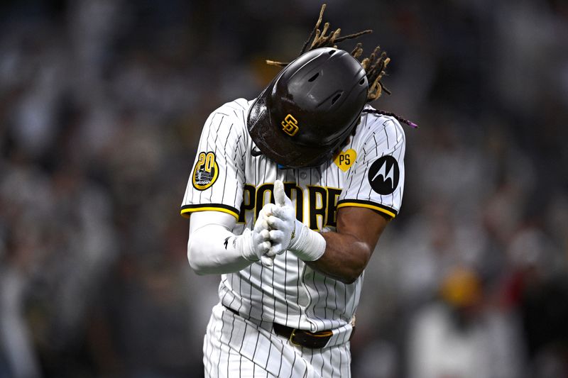 Jun 20, 2024; San Diego, California, USA; San Diego Padres right fielder Fernando Tatis Jr. (23) celebrates after hitting a home run against the Milwaukee Brewers during the fifth inning at Petco Park. Mandatory Credit: Orlando Ramirez-USA TODAY Sports