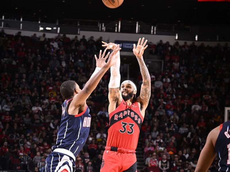 HOUSTON, TX - FEBRUARY 3: Gary Trent Jr. #33 of the Toronto Raptors shoots a three point basket during the game against the Houston Rockets on February 3, 2023 at the Toyota Center in Houston, Texas. NOTE TO USER: User expressly acknowledges and agrees that, by downloading and or using this photograph, User is consenting to the terms and conditions of the Getty Images License Agreement. Mandatory Copyright Notice: Copyright 2023 NBAE (Photo by Logan Riely/NBAE via Getty Images)