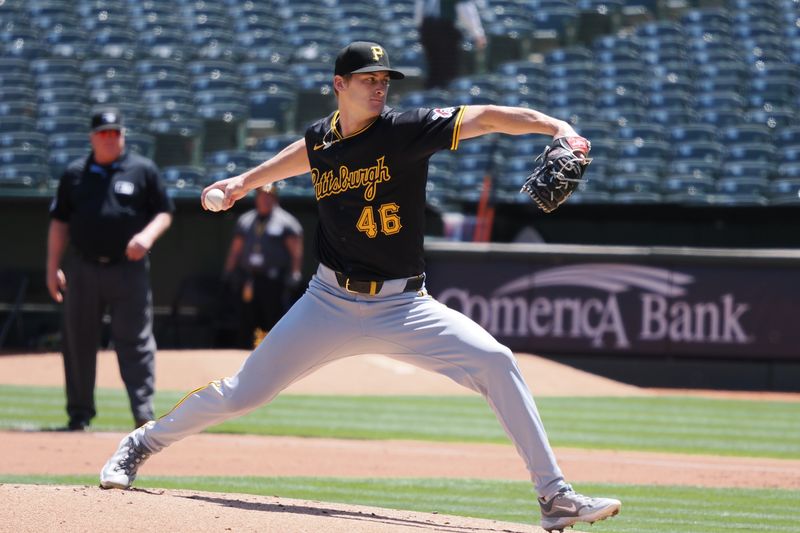 May 1, 2024; Oakland, California, USA; Pittsburgh Pirates starting pitcher Quinn Priester (46) pitches the ball against the Oakland Athletics during the first inning at Oakland-Alameda County Coliseum. Mandatory Credit: Kelley L Cox-USA TODAY Sports