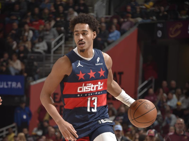 CLEVELAND, OH - DECEMBER 13: Jordan Poole #13 of the Washington Wizards dribbles the ball during the game against the Cleveland Cavaliers on December 13, 2024 at Rocket Mortgage FieldHouse in Cleveland, Ohio. NOTE TO USER: User expressly acknowledges and agrees that, by downloading and/or using this Photograph, user is consenting to the terms and conditions of the Getty Images License Agreement. Mandatory Copyright Notice: Copyright 2024 NBAE (Photo by David Liam Kyle/NBAE via Getty Images)