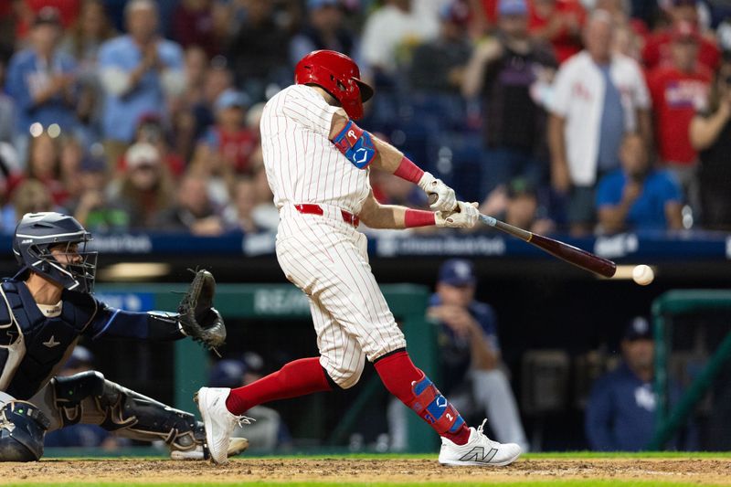 Sep 9, 2024; Philadelphia, Pennsylvania, USA; Philadelphia Phillies first base Kody Clemens (2) hits a walk off game winning RBI single during the ninth inning against the Tampa Bay Rays at Citizens Bank Park. Mandatory Credit: Bill Streicher-Imagn Images