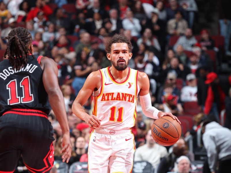 CHICAGO, IL - NOVEMBER 22: Trae Young #11 of the Atlanta Hawks brings the ball up court during the game against the Chicago Bulls during the Emirates NBA Cup game on November 22, 2024 at United Center in Chicago, Illinois. NOTE TO USER: User expressly acknowledges and agrees that, by downloading and or using this photograph, User is consenting to the terms and conditions of the Getty Images License Agreement. Mandatory Copyright Notice: Copyright 2024 NBAE (Photo by Jeff Haynes/NBAE via Getty Images)