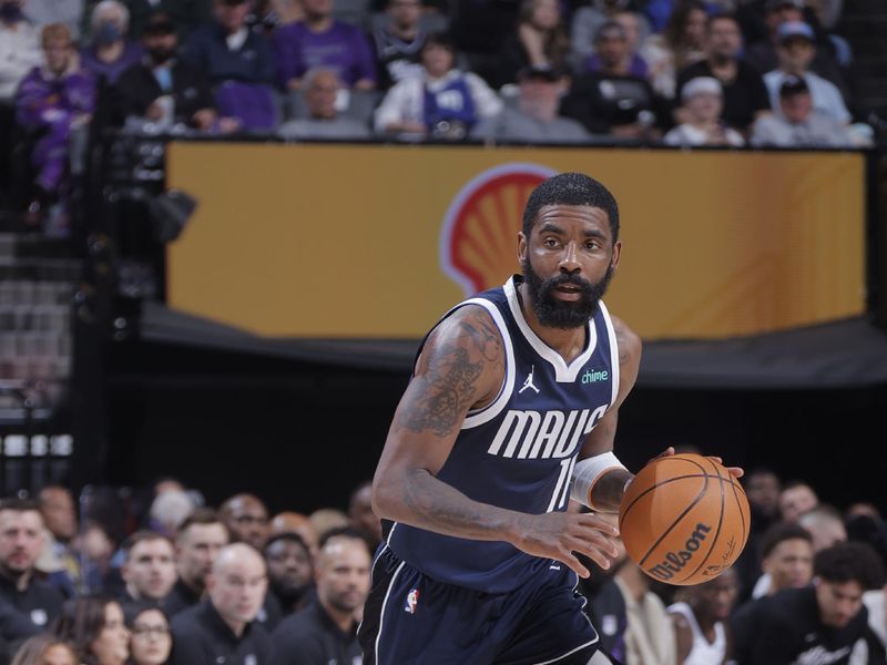 SACRAMENTO, CA - MARCH 29:  Kyrie Irving #11 of the Dallas Mavericks handles the ball during the game  on March 29, 2024 at Golden 1 Center in Sacramento, California. NOTE TO USER: User expressly acknowledges and agrees that, by downloading and or using this Photograph, user is consenting to the terms and conditions of the Getty Images License Agreement. Mandatory Copyright Notice: Copyright 2024 NBAE (Photo by Rocky Widner/NBAE via Getty Images)