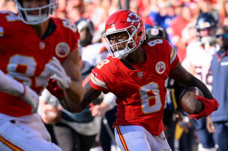 Kansas City Chiefs wide receiver DeAndre Hopkins makes a catch for a first down against the Denver Broncos during the second half of an NFL football game, Sunday, Nov. 10, 2024 in Kansas City, Mo. The Chiefs defeated the Broncos, 16-14. (AP Photo/Reed Hoffmann)