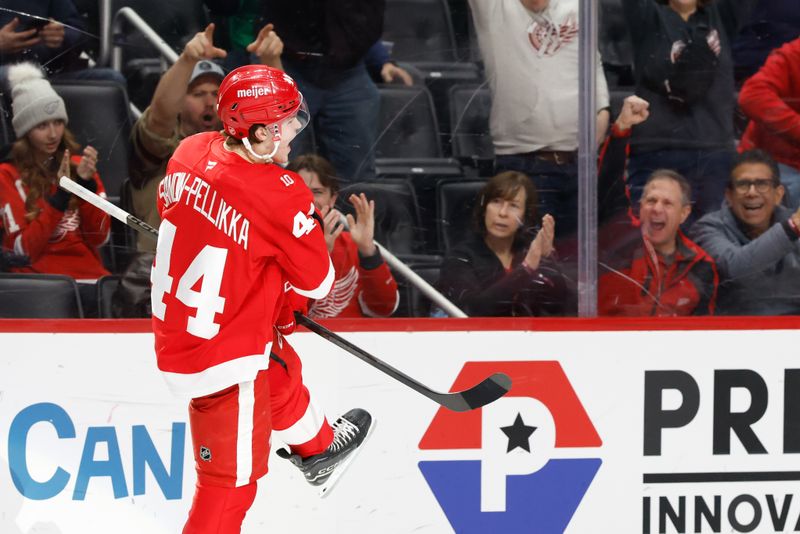 Jan 8, 2026; Detroit, Michigan, USA;  Detroit Red Wings defenseman Axel Sandin-Pellikka (44) celebrates after scoring in the second period against the Vancouver Canucks at Little Caesars Arena. Mandatory Credit: Rick Osentoski-Imagn Images