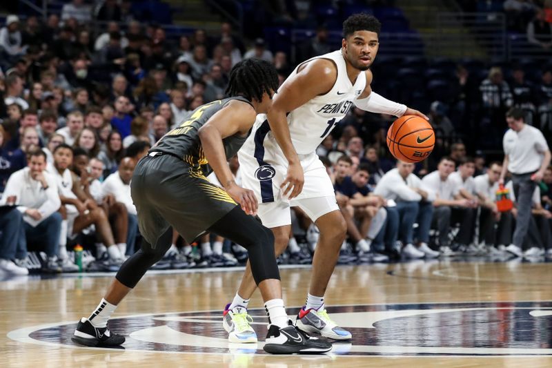 Jan 1, 2023; University Park, Pennsylvania, USA; Penn State Nittany Lions guard Camren Wynter (11) dribbles the ball as Iowa Hawkeyes guard Dasonte Bowen (5) defends during the first half at Bryce Jordan Center. Penn State defeated Iowa 83-79. Mandatory Credit: Matthew OHaren-USA TODAY Sports