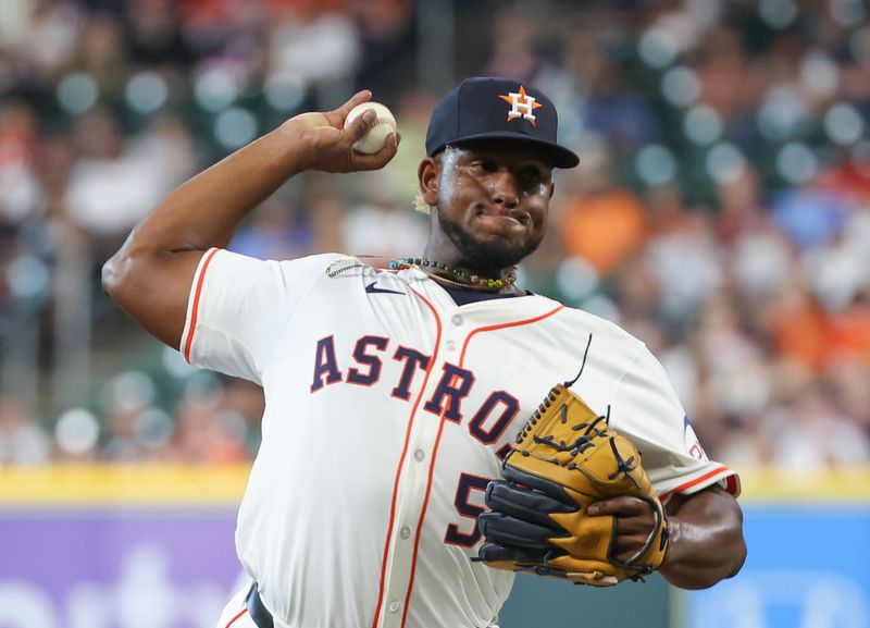 Apr 13, 2024; Houston, Texas, USA; Houston Astros pitcher Ronel Blanco (56) pitches against the Texas Rangers in the first inning at Minute Maid Park. Mandatory Credit: Thomas Shea-USA TODAY Sports
