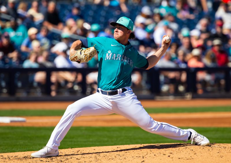 Mar 5, 2024; Peoria, Arizona, USA; Seattle Mariners pitcher Holden Laws against the Texas Rangers during a spring training baseball game at Peoria Sports Complex. Mandatory Credit: Mark J. Rebilas-USA TODAY Sports