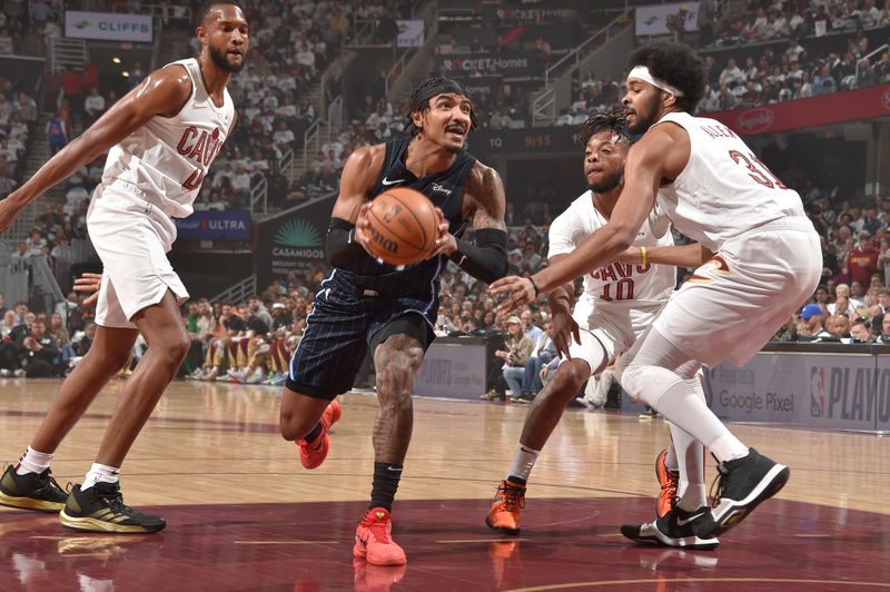 CLEVELAND, OH - APRIL 22: Gary Harris #14 of the Orlando Magic drives to the basket during the game against the Cleveland Cavaliers during Round 1 Game 2 of the 2024 NBA Playoffs on April 22, 2024 at Rocket Mortgage FieldHouse in Cleveland, Ohio. NOTE TO USER: User expressly acknowledges and agrees that, by downloading and/or using this Photograph, user is consenting to the terms and conditions of the Getty Images License Agreement. Mandatory Copyright Notice: Copyright 2024 NBAE (Photo by David Liam Kyle/NBAE via Getty Images)